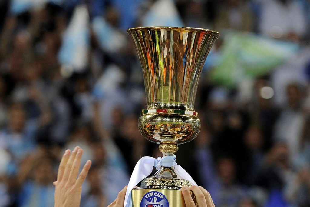 Lazio's player hold the cup after defeat