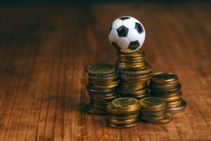 soccer-bet-concept-football-money-small-top-coin-stack-making-predicting-sport-results-61855080