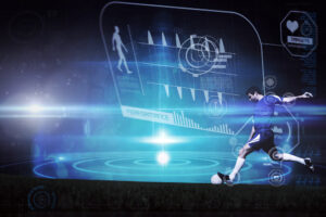 Football player kicking ball against futuristic shiny black background